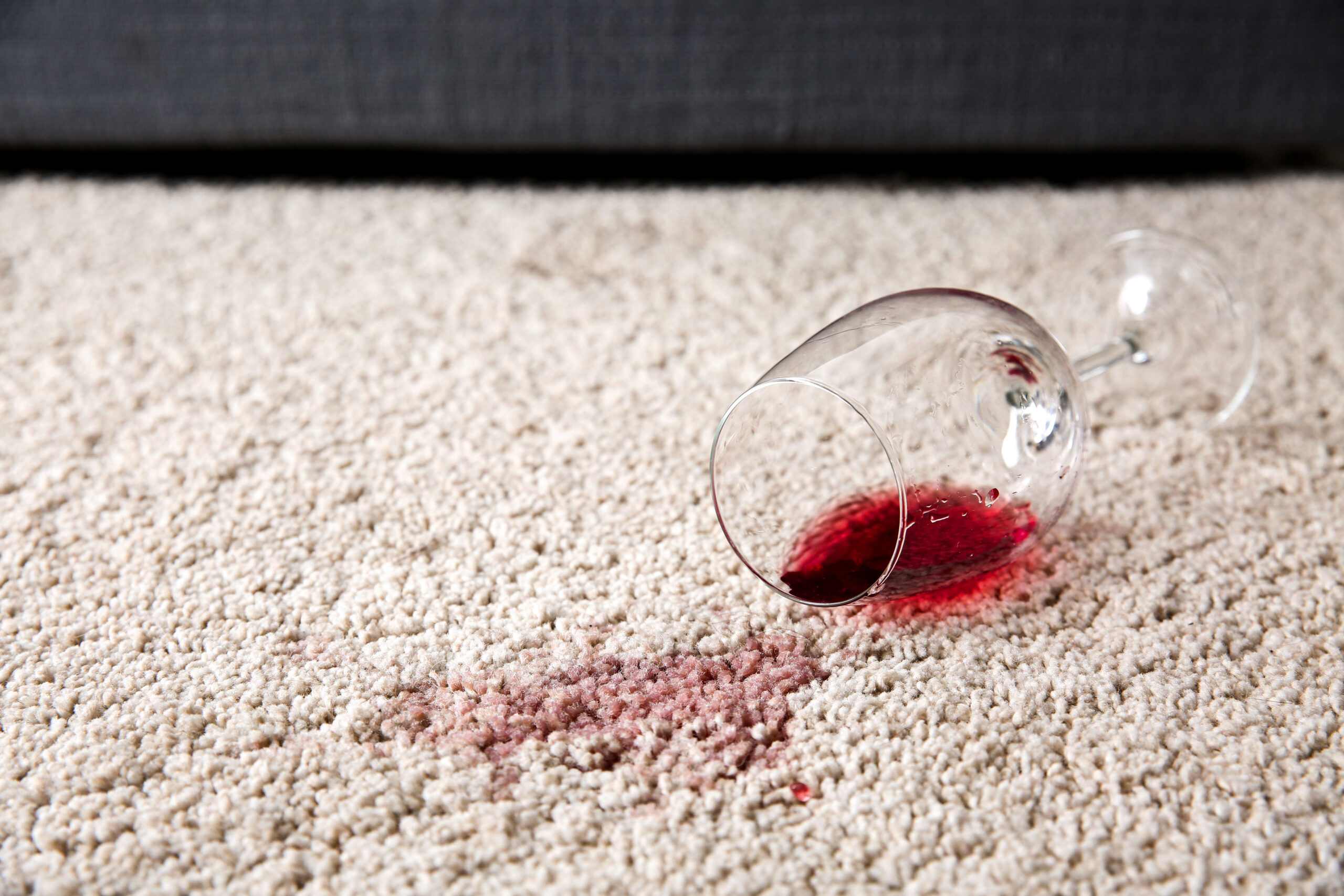 Broken Wine Glass on Carpet